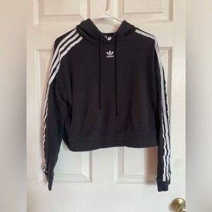 Adidas size small hoodie with white strips on each arm